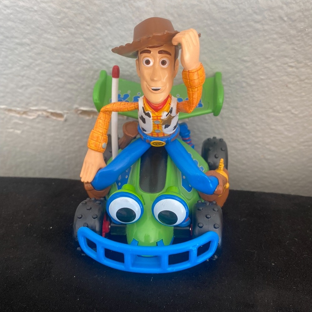 Toy Story Woody on Green and Blue Car